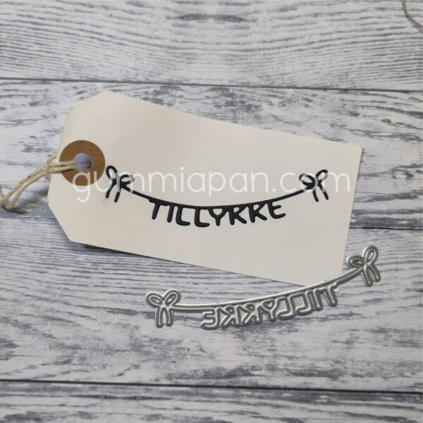 Gummiapan Die Tillykke på Tråd