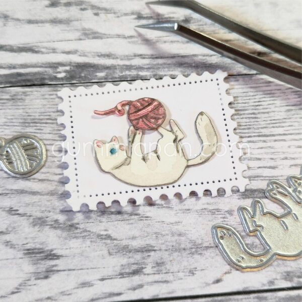 Gummiapan  Katt med garnnøste