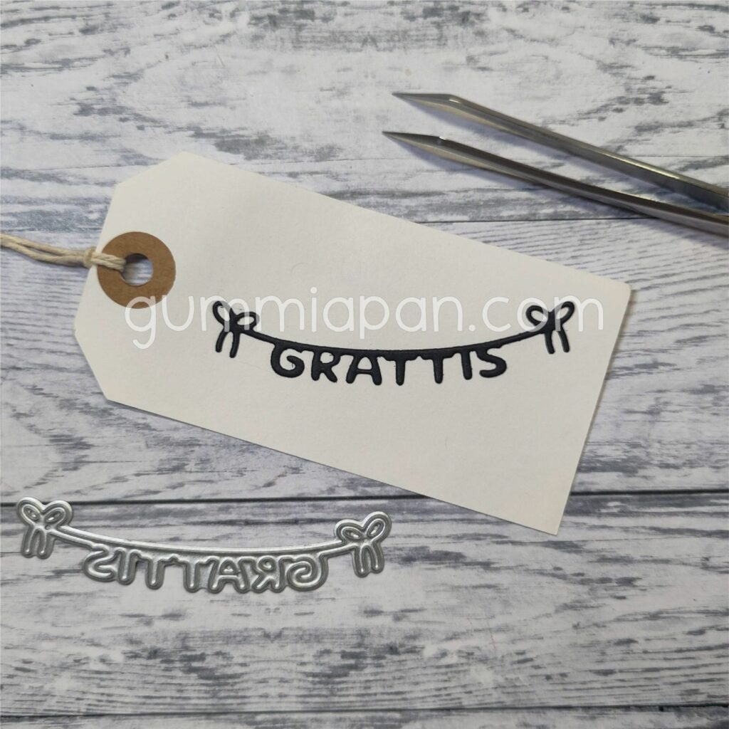 Gummiapan Dies Grattis på tråd