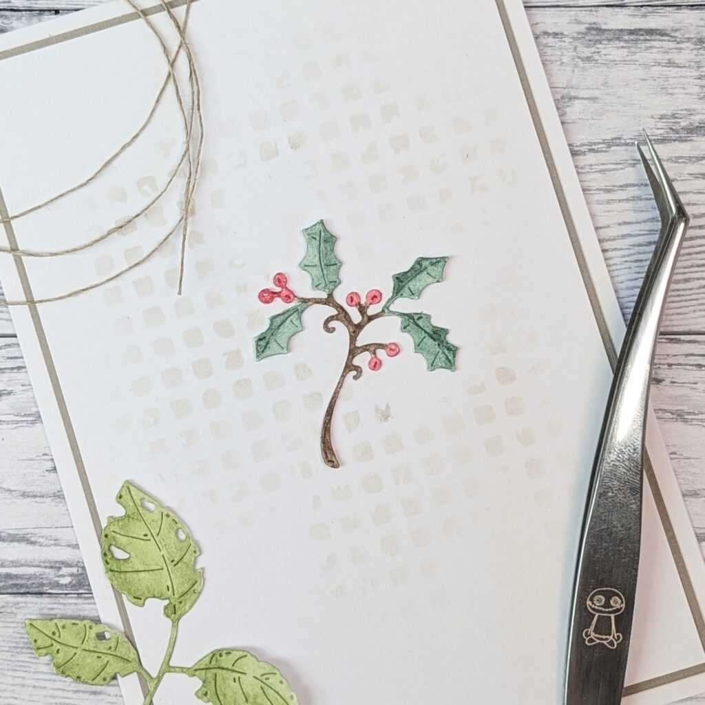Gummiapan  Liten kristtornskvist